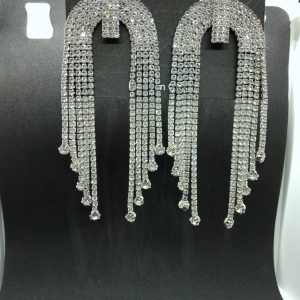 "Silver N-shaped tassel earrings inlaid with crystals hanging elegantly."