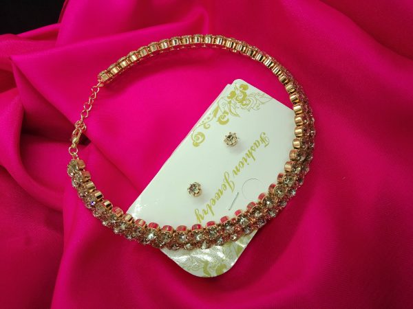 "HashtagAllin three-line stone choker necklace set in gold, perfect for bridal wear."