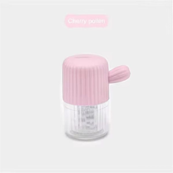 Portable contact lens cleaning box in pink for easy storage and travel.